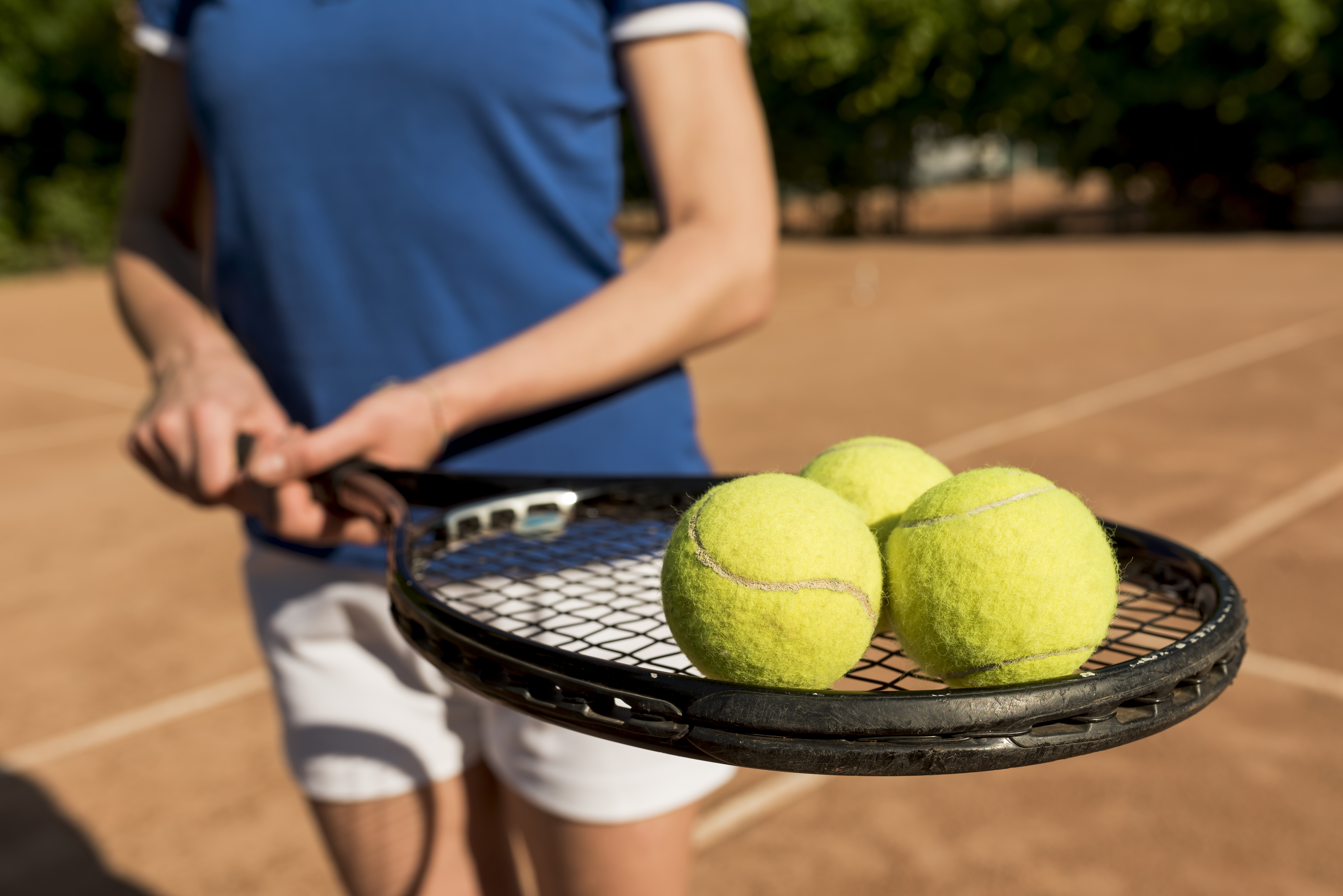 Children learning tennis